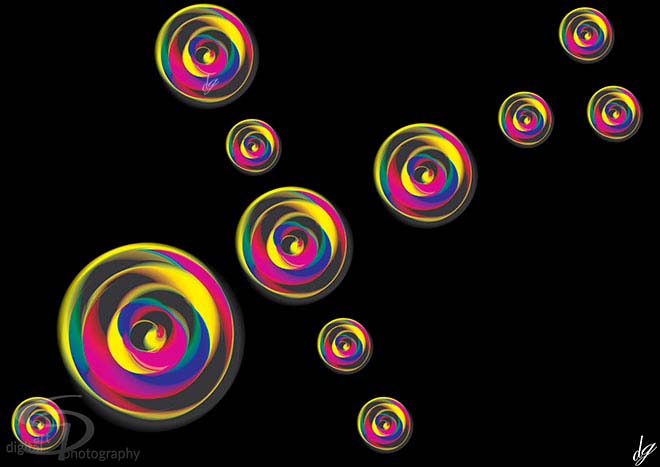 Digital Art: Colorful balls in different sizes on a black background.