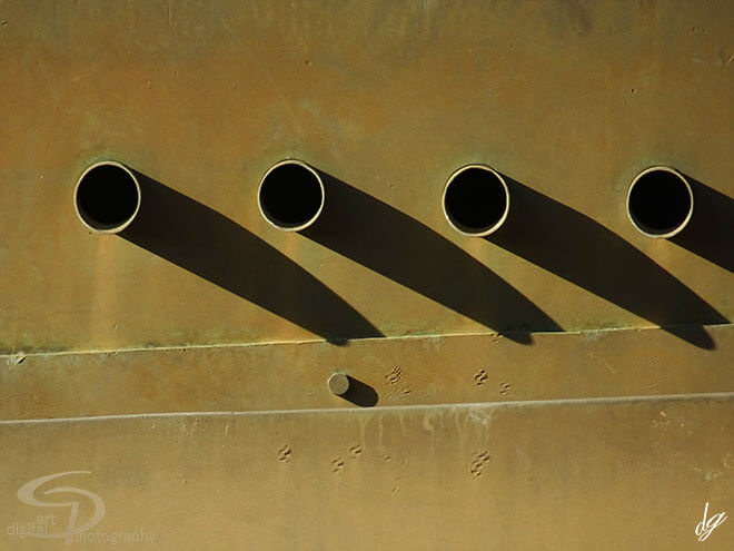 Four pipes on yellow-brown background. The title of the picture is called - Observation.