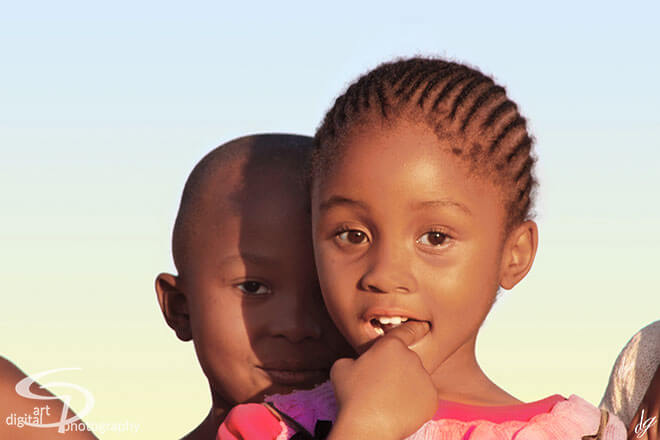 A little girl in  Lesotho. The title of the picture is called - Hmm