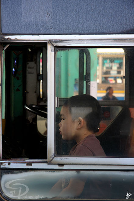 Little boy in a bus in Thailand